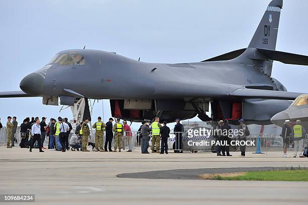Visitors view a US Air Force B-1 bomber on the opening day of the Australian International Airshow and Aerospace and Defence Expo in Melbourne on...