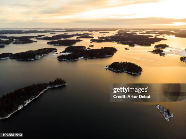 stunning aerial view of the stockholm archipelago islands with sunset light. - archipelago stock pictures, royalty-free photos & images