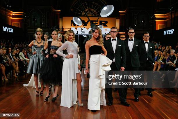 Model Jennifer Hawkins showcases a design by Matthew Eager and Jessica Hart wears Magdalena Veleveska during the Finale on the catwalk during the...