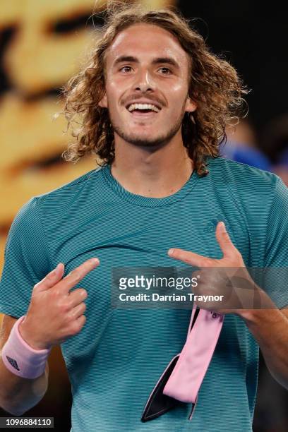 Stefanos Tsitsipas of Greece reacts after winning his fourth round match against Roger Federer of Switzerland during day seven of the 2019 Australian...