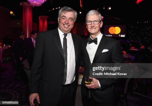 Eddy Cue and Tim Cook attend the Pre-GRAMMY Gala and GRAMMY Salute to Industry Icons Honoring Clarence Avant at The Beverly Hilton Hotel on February...
