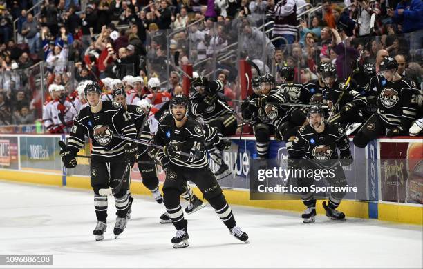 Hershey Bears right wing Beck Malenstyn , left wing Shane Gersich , and left wing Nathan Walker lead the team onto the ice to congratulate goalie...