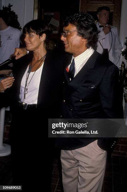 Ali MacGraw and producer Robert Evans attend the premiere party for "Two Jakes" on August 6, 1990 at Chasen's Restaurant in Beverly Hills, California.