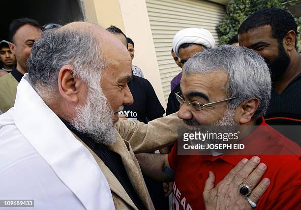 YAZBECKBahraini leading Shiite activist Hassan Mashaima is greeted by fellow opposition leader Abduljalil Singace, upon his arrival at his home in...