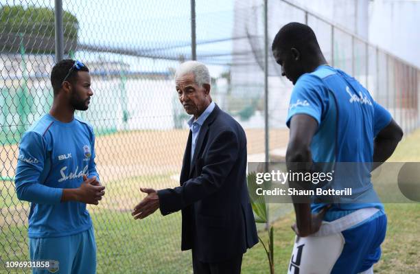 Sir Garfield Sobers talks West Indies captain Jason Holder and Shai Hope during net practice at Kensington Oval on January 19, 2019 in Bridgetown,...