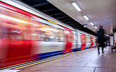 Moving train, motion blurred, London Underground - Immagine