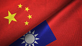 Taiwan and China two flags together textile cloth, fabric texture
