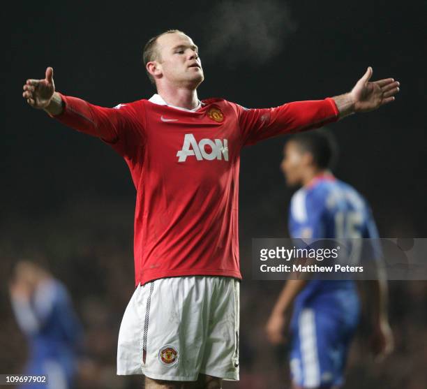 Wayne Rooney of Manchester United celebrates scoring their first goal during the Barclays Premier League match between Chelsea and Manchester United...
