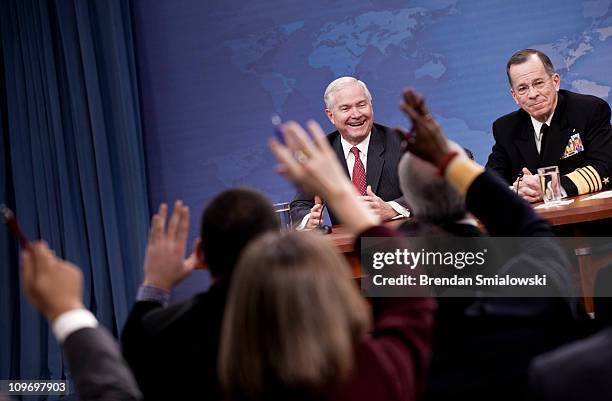 Secretary of Defense Robert M. Gates and Chairman of the Joint Chiefs of Staff Navy Admiral Mike Mullen smile while taking questions during a press...