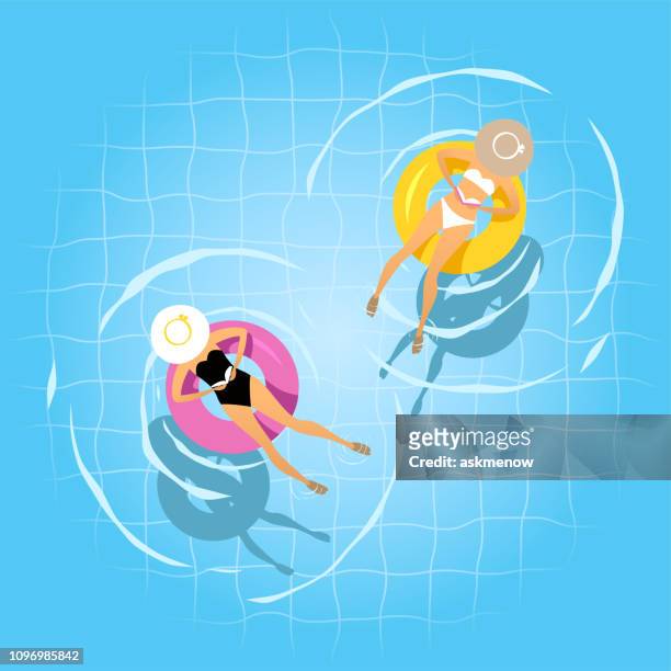 ilustrações de stock, clip art, desenhos animados e ícones de two women swimming on the inflatable ring - ao lado da piscina