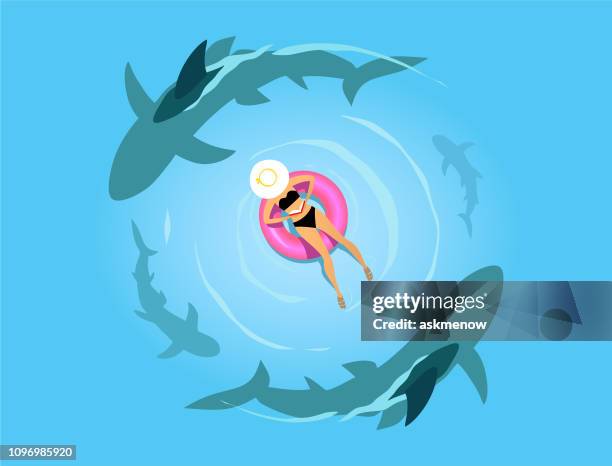 woman on the inflatable ring with sharks - swimming float stock illustrations