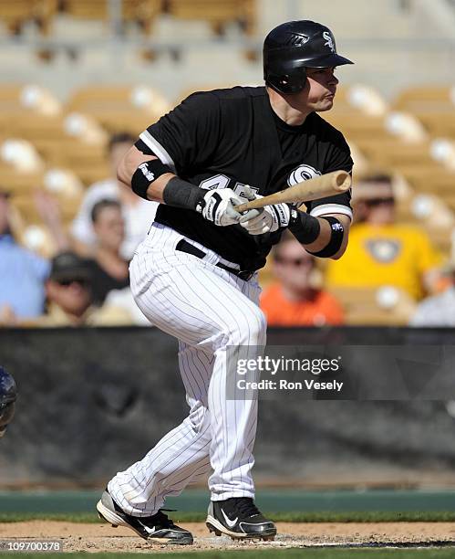 Dallas McPherson of the Chicago White Sox bats against the Milwaukee Brewers on March 01, 2011 at The Ballpark at Camelback Ranch in Glendale,...