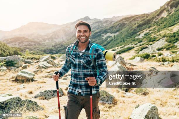 happy hiker high in the mountain - portrait of a camper stock pictures, royalty-free photos & images