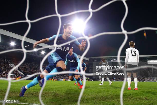 Harry Winks of Tottenham celebrates after he scores his sides second goal during the Premier League match between Fulham FC and Tottenham Hotspur at...