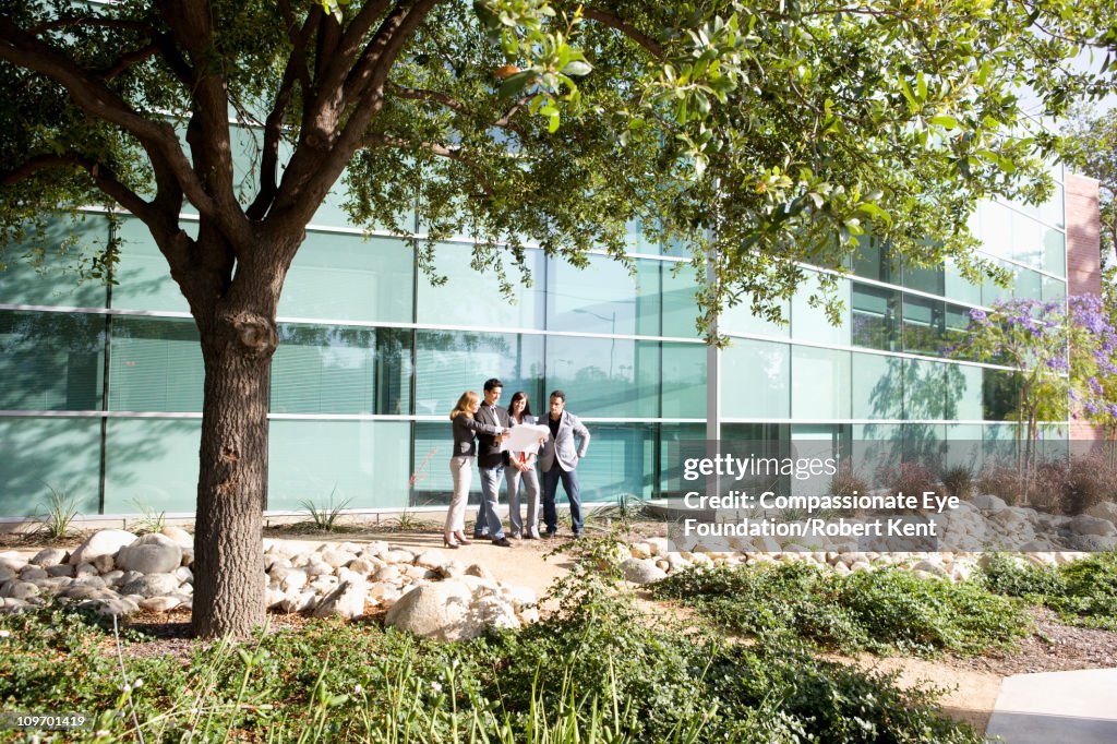 Group of business people standing outside