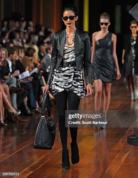 Models showcase designs by Wayne Cooper on the catwalk during the Myer Autumn/Winter Season Launch 2011 Show at The Royal Exhibition Building on...