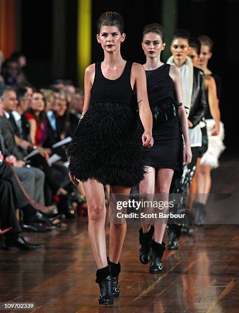 Models showcase designs by Fernando Frisoni on the catwalk during the Myer Autumn/Winter Season Launch 2011 Show at The Royal Exhibition Building on...