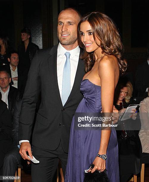 Model Rebecca Judd and AFL player Chris Judd arrive at the Myer Autumn/Winter Season Launch 2011 at The Royal Exhibition Building on March 1, 2011 in...