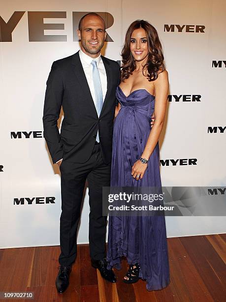 Model Rebecca Judd and AFL player Chris Judd arrive at the Myer Autumn/Winter Season Launch 2011 at The Royal Exhibition Building on March 1, 2011 in...