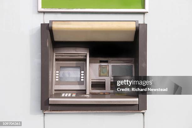 cash machine - atm stock pictures, royalty-free photos & images