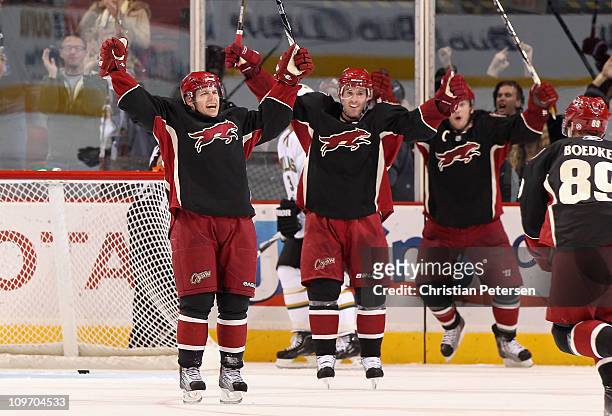 Ray Whitney, Eric Belanger, Shane Doan and Mikkel Boedker of the Phoenix Coyotes celebrate after Whitney scored a late third period goal against the...