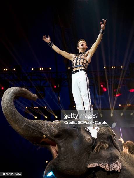 An acrobat and an elephant perform during the 43rd International Circus Festival of Monte-Carlo on January 20, 2019 in Monaco, Monaco.