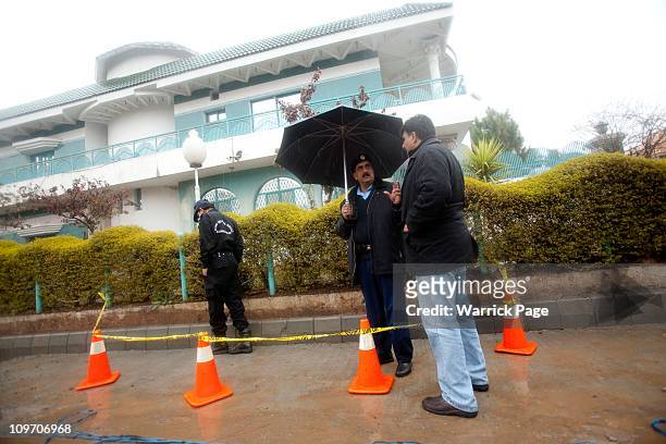Police officers investigate the site of Pakistan Minority Minister, Shahbaz Bhatti's assassination near his mother's home on March 2, 2011 in...