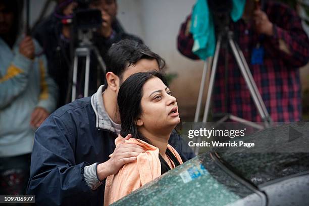 Mourner weeps as she leaves the home of Pakistan Minority Minister, Shahbaz Bhatti's mother after his assassination, on March 2 in Islamabad,...