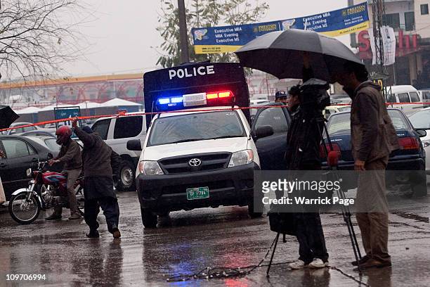 Police arrive at the scene of Pakistan Minority Minister, Shahbaz Bhatti's assassination near his mother's home on March 2, 2011 in Islamabad,...