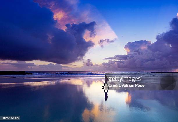 girl walking on beach, tiree - western isles stock pictures, royalty-free photos & images