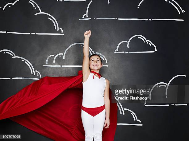 portrait of girl dressed as a superhero - cape garment stock pictures, royalty-free photos & images
