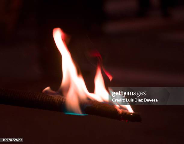 burning torch - torch bearer stock pictures, royalty-free photos & images