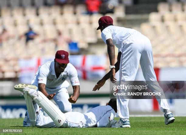 Shannon Gabriel of West Indies in celebration with Shane Dowrich for taking the catch to dismiss Ben Stokes of England during day 2 of the 3rd and...