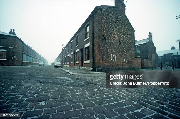 Terraced houses on cobbled streets lined with setts in Manchester, England in 1976.
