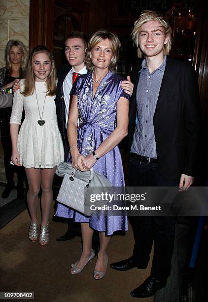 Andrew Lloyd Webber Family Isabella, Alastair, his wife Madelaine and William attend the press night for Wizard Of Oz at the London Palladium on...