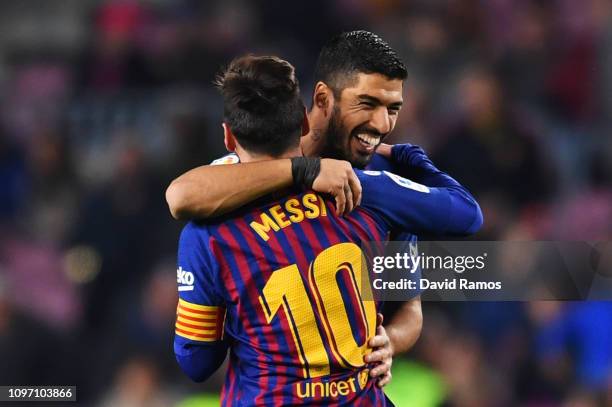 Luis Suarez of Barcelona celebrates after scoring his team's second goal with Lionel Messi during the La Liga match between FC Barcelona and CD...