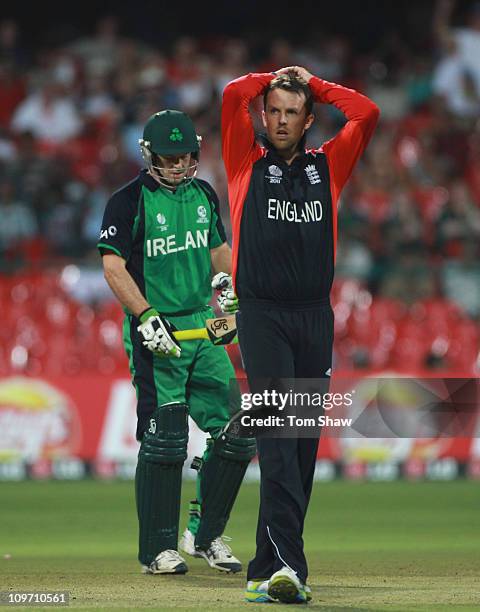 Graeme Swann of England looks on as a chance is dropped during the 2011 ICC World Cup Group B match between England and Ireland at the M. Chinnaswamy...