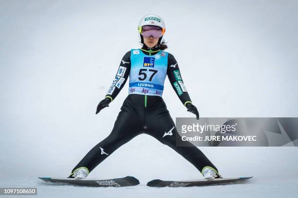 Japan's ski jumper Sara Takanashi reacts in the finish area during the FIS Ladies Ski Jumping World Cup Normal Hill Individual in Ljubno, Slovenia on...