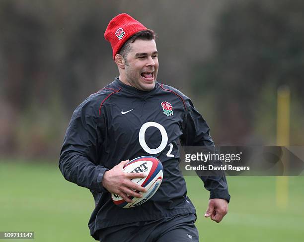 Nick Easter runs with the ball during the England training session held at St.Edward's School on March 2, 2011 in Oxford, England.