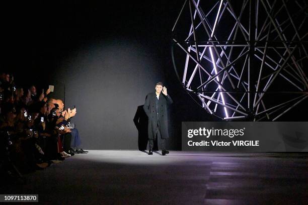 Fashion designer Hedi Slimane walks the runway during the Celine Menswear Fall/Winter 2019-2020 show as part of Paris Fashion Week on January 20,...