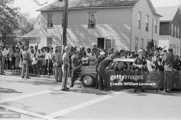 Policemen on duty during a race riot in Rochester, New York State, late July 1964.