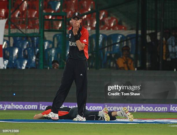 Stuart Broad of England looks away after Andrew Strauss of england drops a catch during the 2011 ICC World Cup Group B match between England and...