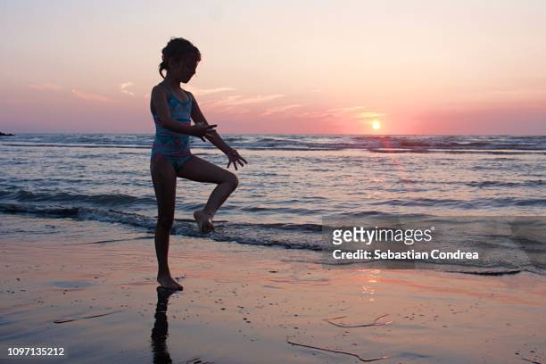 ballet dancer on the beach in sunset, butva, montenegro - child silhouette ocean stock pictures, royalty-free photos & images