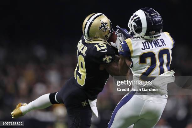 Ted Ginn of the New Orleans Saints makes a 43-yard catch against Lamarcus Joyner of the Los Angeles Rams in the fourth quarter in the NFC...