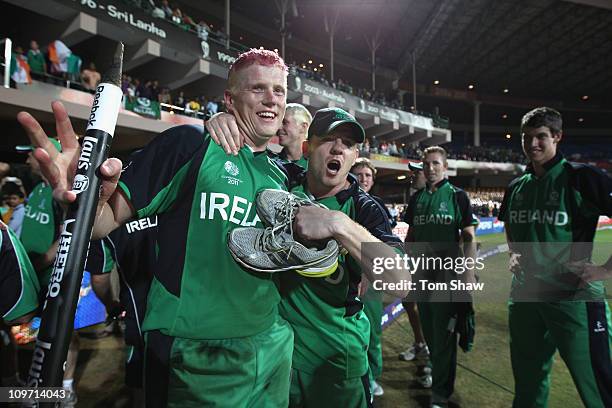 Kevin O'Brien of Ireland celebrates with Niall O'Brien of Ireland at the end of the match during the 2011 ICC World Cup Group B match between England...