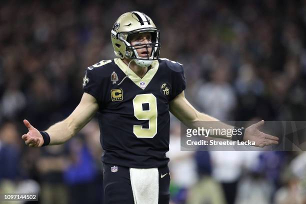 Drew Brees of the New Orleans Saints reacts against the Los Angeles Rams during the fourth quarter in the NFC Championship game at the Mercedes-Benz...
