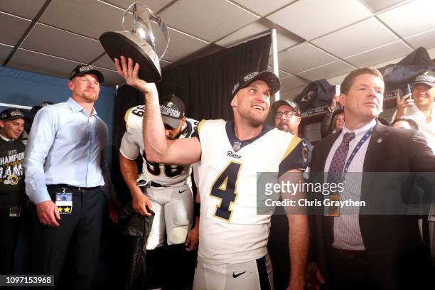 Greg Zuerlein of the Los Angeles Rams celebrates with the NFC Trophy after defeating the New Orleans Saints in the NFC Championship game at the...