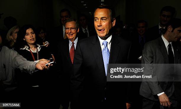 Senate Majority Leader Mitch McConnell and House Speaker John Boehner leave after holding a news conference at the U.S. Capitol on March 2, 2011 in...