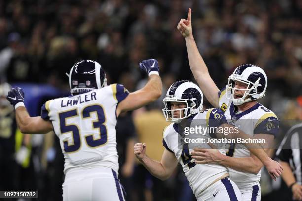 Greg Zuerlein of the Los Angeles Rams celebrates after kicking the game winning field goal in overtime against the New Orleans Saints in the NFC...