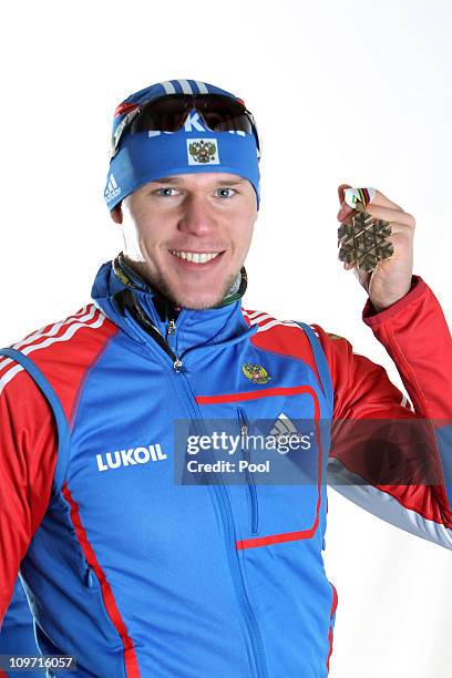 Alexander Panzhinskiy of Russia poses with the bronze medal won in the Men's Cross Country Team Sprint race during the FIS Nordic World Ski...